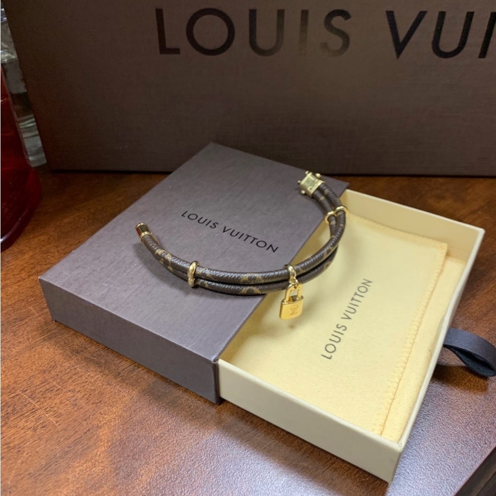 LV authentic bracelet with charm